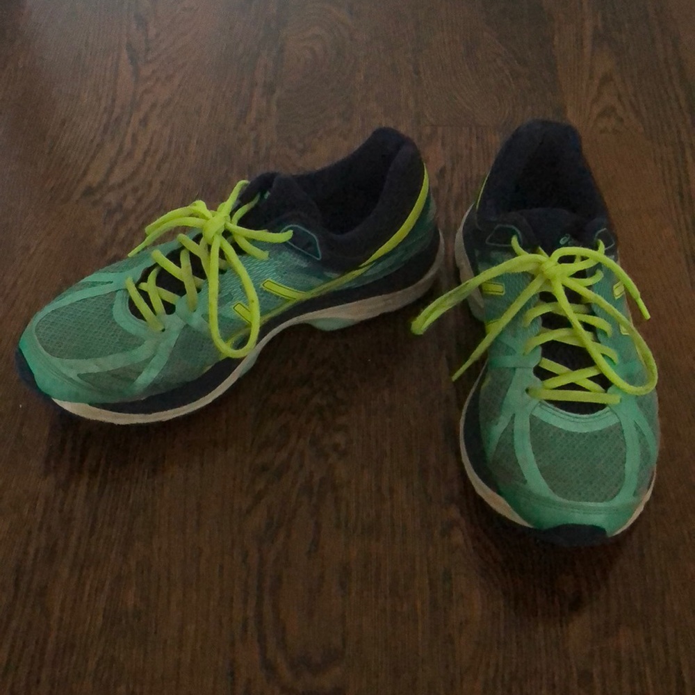 ASICS Tennis Shoes. Size 9. Lightly worn.
